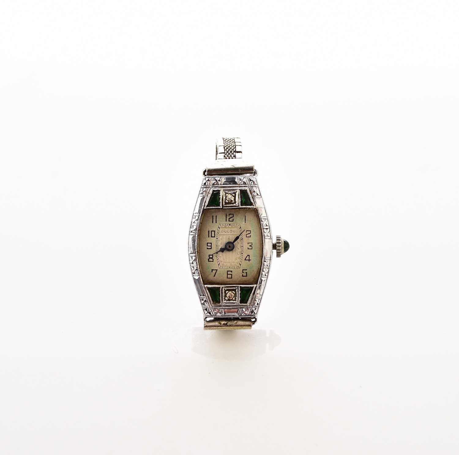 Lot 409 - Bulova: A ladies 14k white gold stone set dress watch
