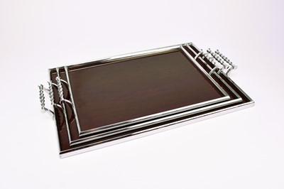 Lot 502 - A graduated set of three art deco style service trays