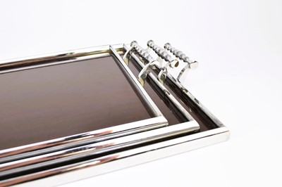 Lot 502 - A graduated set of three art deco style service trays