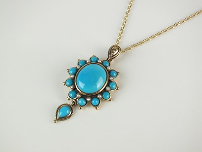 Lot 217 - A turquoise and split pearl pendant on chain