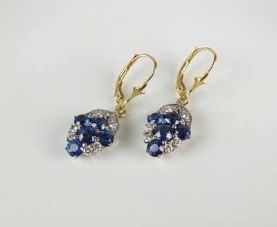 Lot 300 - A pair of sapphire and diamond drop earrings