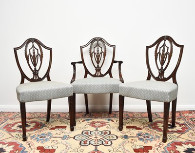 Lot 259 - A set of ten mahogany dining chairs in the Hepplewhite style