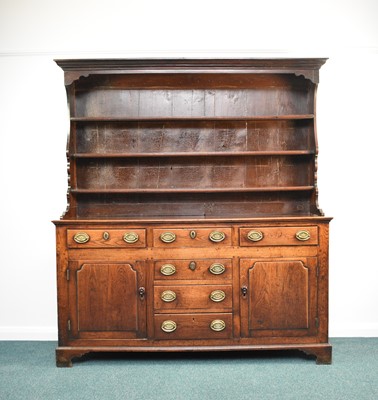 Lot 174 - A George III oak dresser and rack, Mid Wales