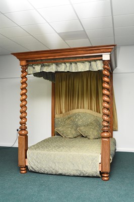 Lot 195 - A mahogany four-poster bed in the George III style