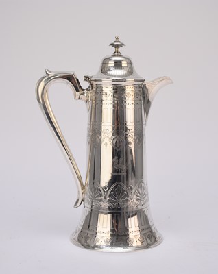 Lot 90 - A Victorian silver lidded hot water jug