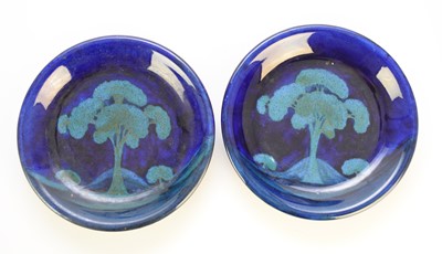 Lot 257 - A pair of William Moorcroft 'Moonlit Blue' plates, circa 1925