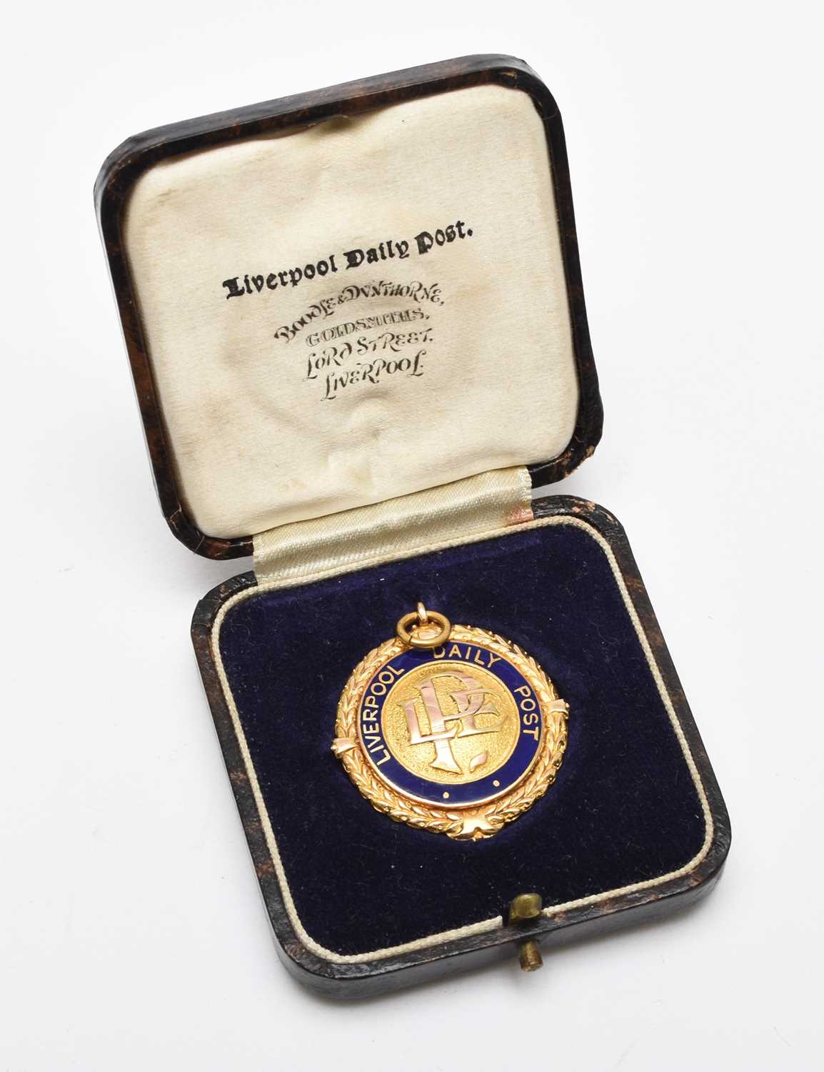 Lot 199 - Liverpool Daily Post - Points Medal, 9ct gold and blue enamel, circular medal Birmingham 1935