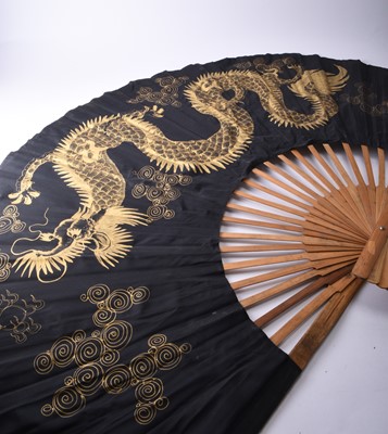 Lot 291 - A large decorative painted fan, Thailand, 20th century