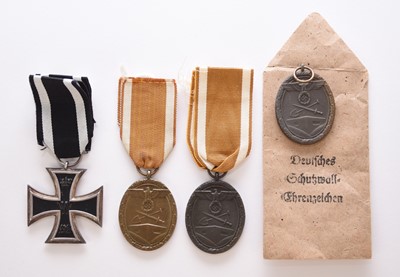 Lot 126 - Germany - WW1 1914 Iron Cross and three West Wall medals.