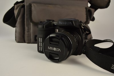 Lot 602 - A collection of roll film cameras, lenses and accessories