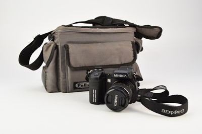 Lot 602 - A collection of roll film cameras, lenses and accessories