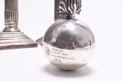 Lot 97 - A novelty silver table lighter in the form of a bomb and two candlesticks