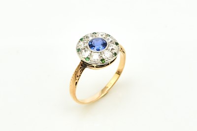 Lot 29 - An early-mid 20th century sapphire, diamond and emerald cluster ring