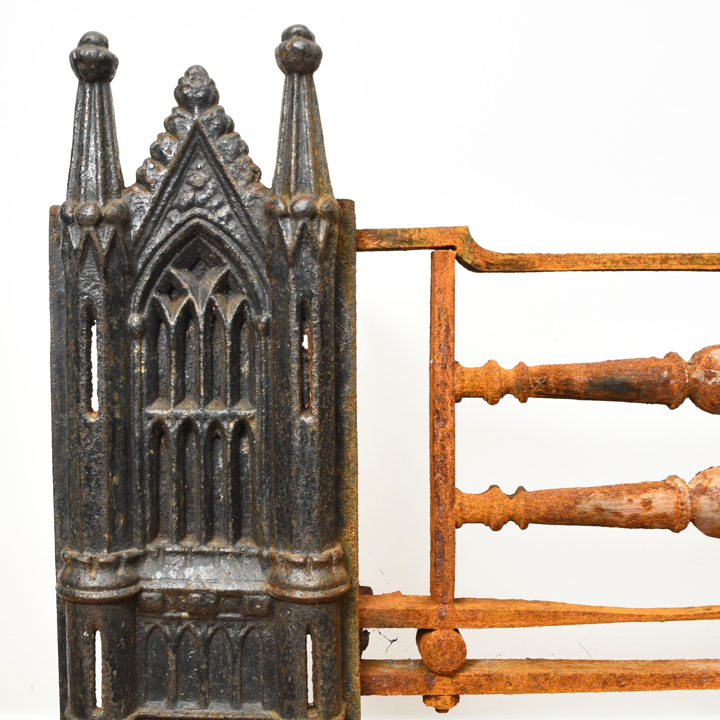 Lot 161 A cast iron Gothic revival fireplace of