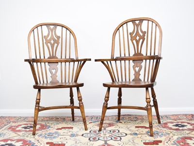 Lot 175 - A set of six reproduction ash Windsor armchairs