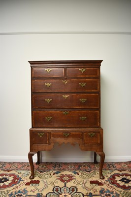 Lot 176 - A George III cross-banded oak chest on stand