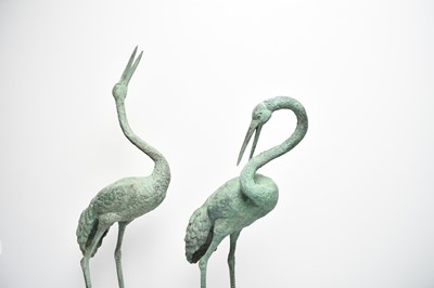 Lot 223 - A pair of bronze garden statues of crane birds