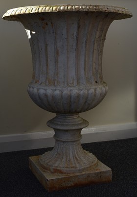 Lot 219 - A pair of cast iron garden urns, late Victorian