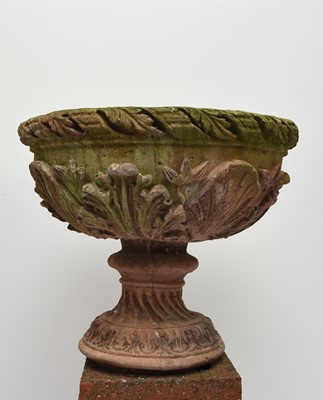 Lot 220 - A pair of buff terracotta garden urns on associated pedestal bases