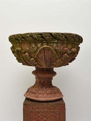 Lot 220 - A pair of buff terracotta garden urns on associated pedestal bases