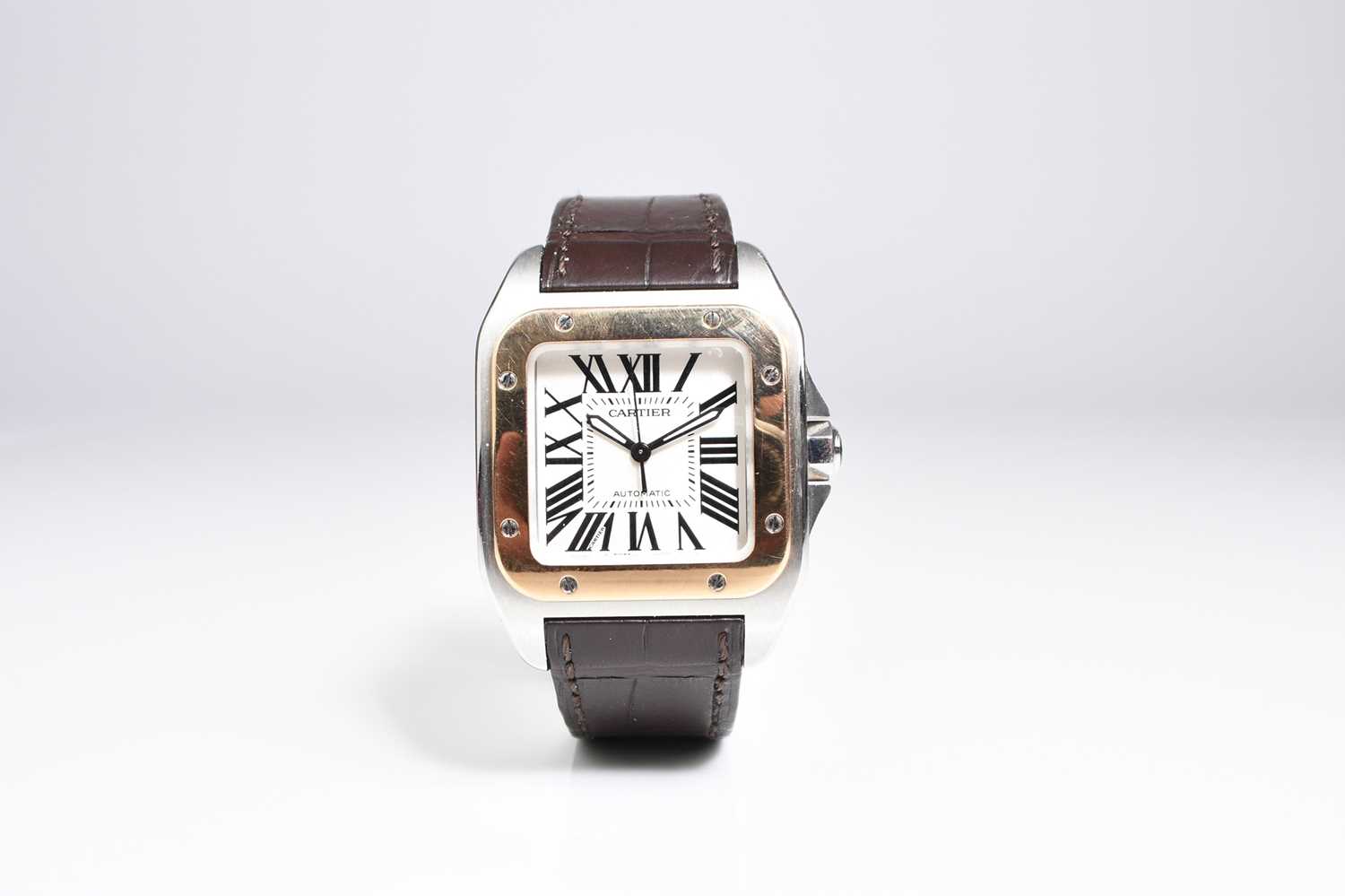 56 - Cartier: A gentleman's stainless steel and 18ct gold Santos 100 wristwatch