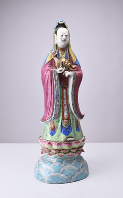 Lot 71 - A Chinese famille rose figure of Guanyin, Qing Dynasty