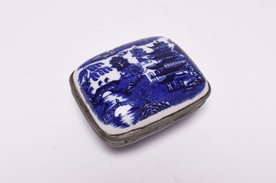 Lot 98 - Seven Royal Doulton 'Dogs of Character' and a willow pattern box