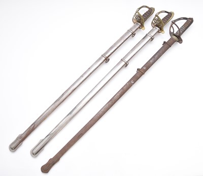 Lot 151 - British 18217P Light Cavalry Officer's sword (Geo VI) and two reproduction swords