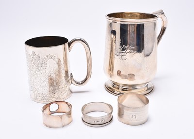 Lot 11 - Two silver mugs and three silver napkin rings