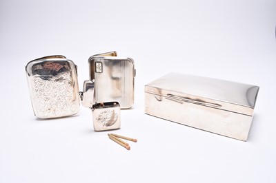 Lot 41 - A silver mounted cigarette box, two silver cigarette cases and a vesta case
