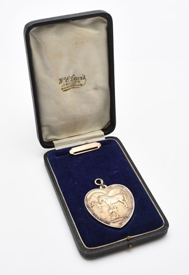 Lot 200 - A Silver heart-shaped medal "Our Dumb Friends League" "A Society for the Encouragement of Kindness to Animals" awarded to "Griffith V. Jones"