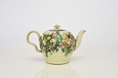 Lot 109 - William Greatbatch creamware 'Fruit Basket' teapot and cover, circa 1770