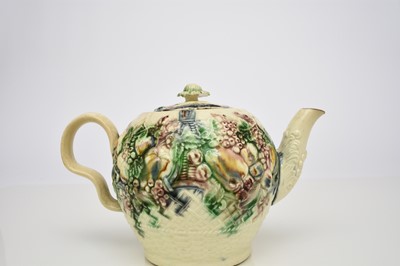 Lot 109 - William Greatbatch creamware 'Fruit Basket' teapot and cover, circa 1770