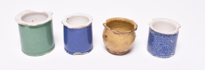 Lot 14 - Four ointment pots