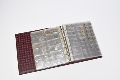 Lot 239 - Maroon album containing 135 world coins form Europe and Asia