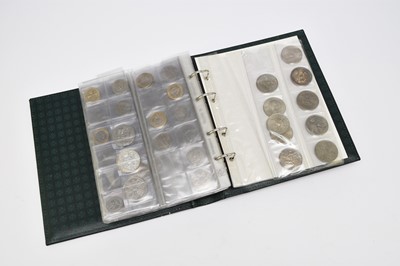 Lot 241 - An album containing a collection of approximately 175 UK cupro-nickel and bronze coinage