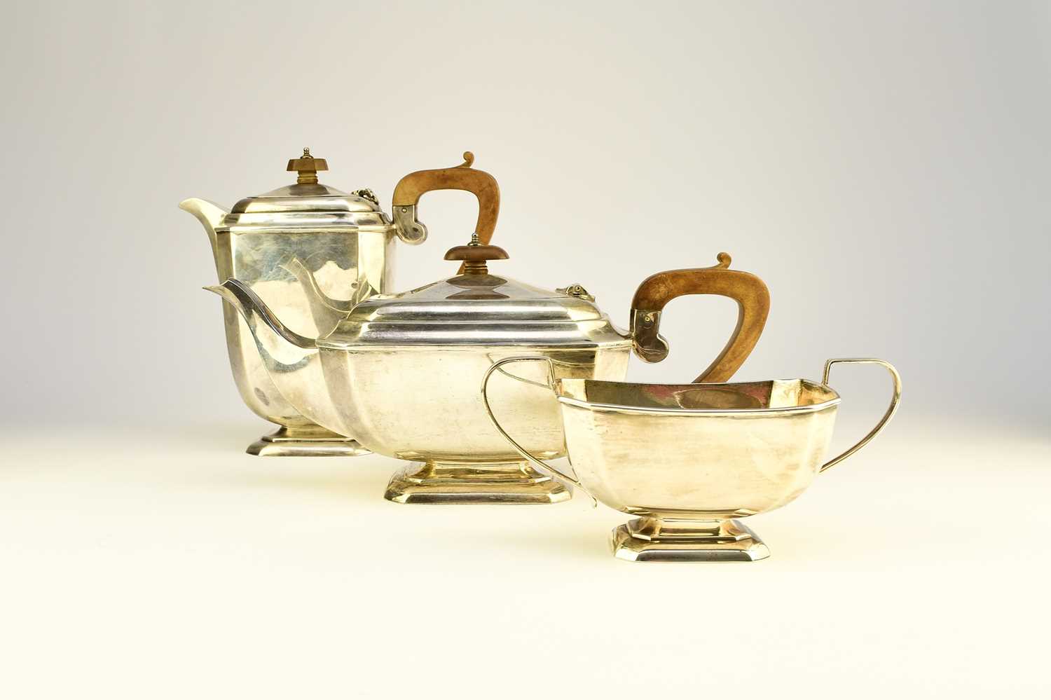 Lot 12 - A three piece silver tea service