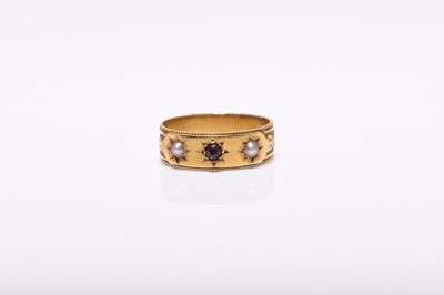 Lot 233 - An 18ct gold decorative band