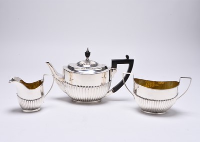 Lot 70 - A matched three piece silver tea service