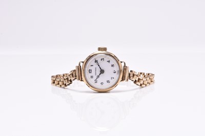 Lot 456 - A lady's 9ct gold bracelet watch