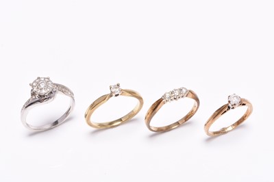 Lot 353 - Four 9ct gold diamond set rings