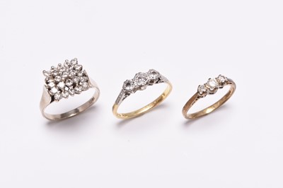 Lot 409 - Three diamond set rings