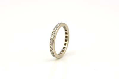 Lot 41 - A diamond set eternity ring