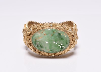 Lot 392 - A jade and gilt metal bangle and a pair of jade earrings