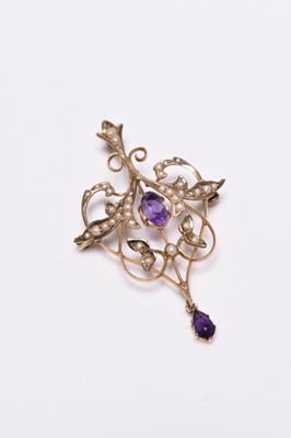 Lot 405 - An early 20th century amethyst and split seed pearl pendant