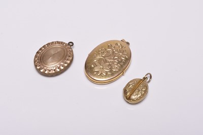 Lot 342 - Three oval locket pendants