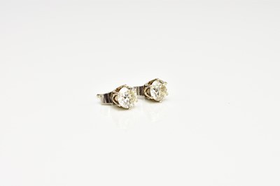 Lot 43 - A pair of diamond stud earrings