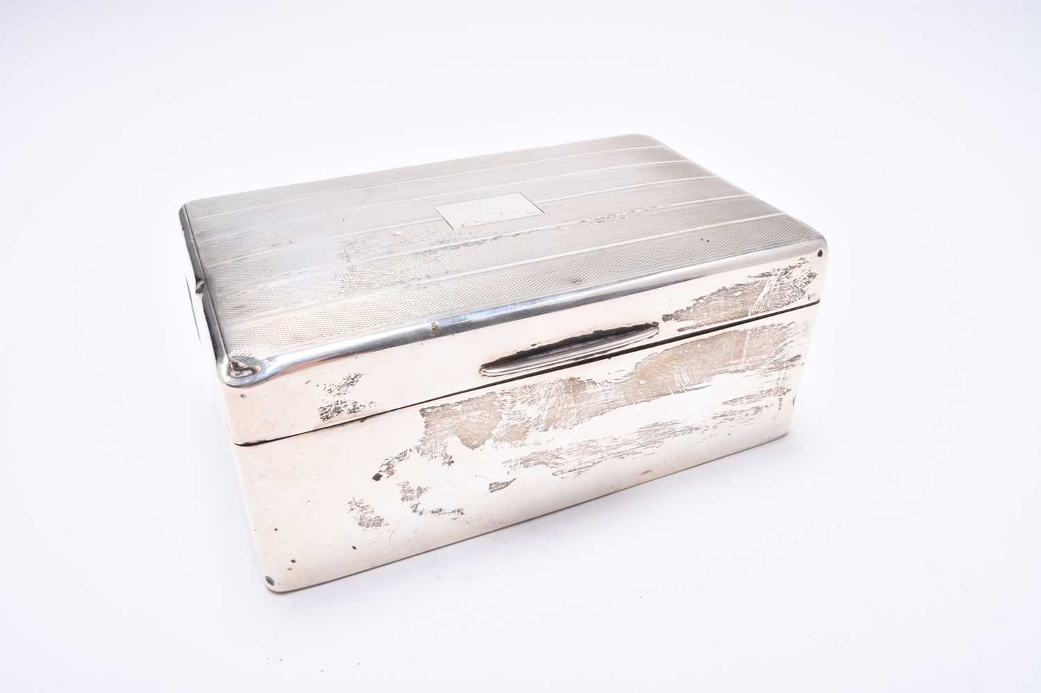 Lot 20 - A silver mounted cigarette box