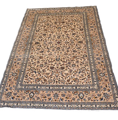 Lot 328 - A Kashan carpet