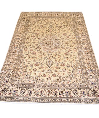 Lot 329 - A Kashan carpet